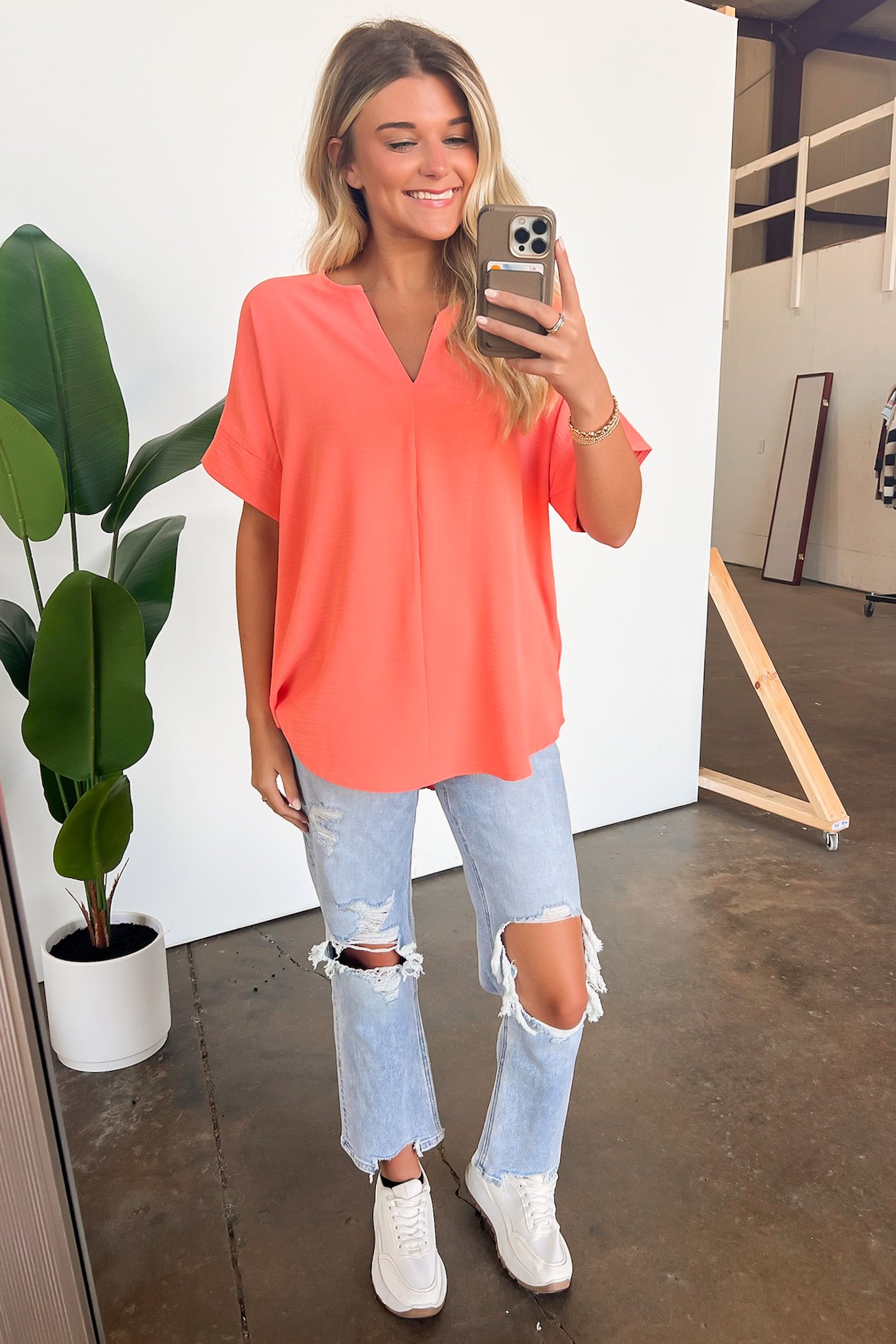 orange flowy top