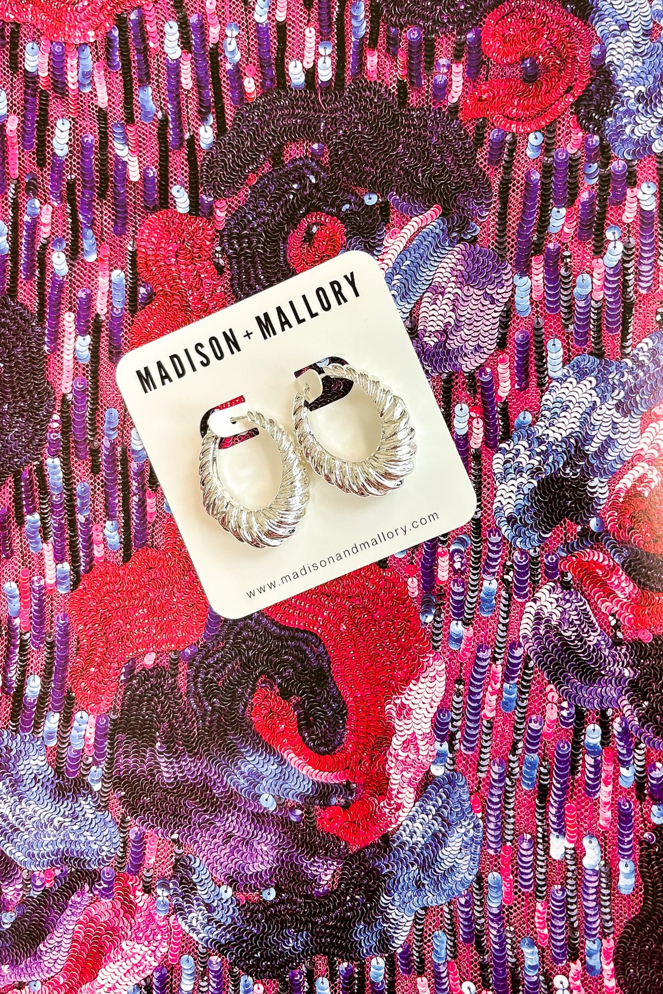 Gleam Twist Oval Huggie Hoop Earrings - Madison and Mallory