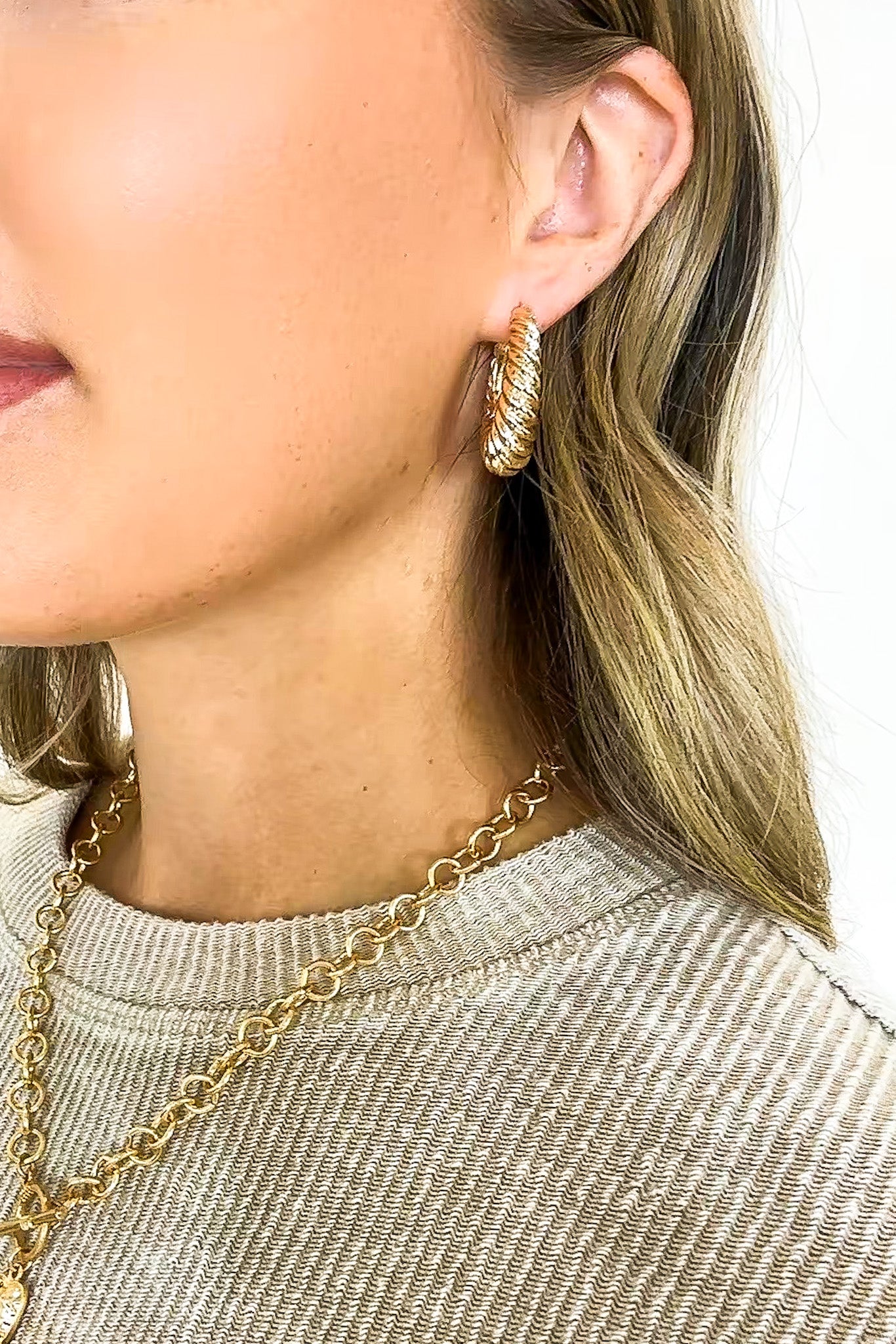 Gleam Twist Oval Huggie Hoop Earrings - Madison and Mallory