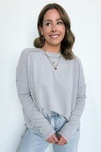 Coy Cutie Textured Raw Edge Boat Neck Top - Madison and Mallory