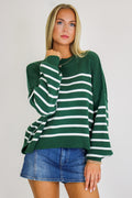 Seam Story Striped Oversized Sweater in Dark Green with a denim skirt
