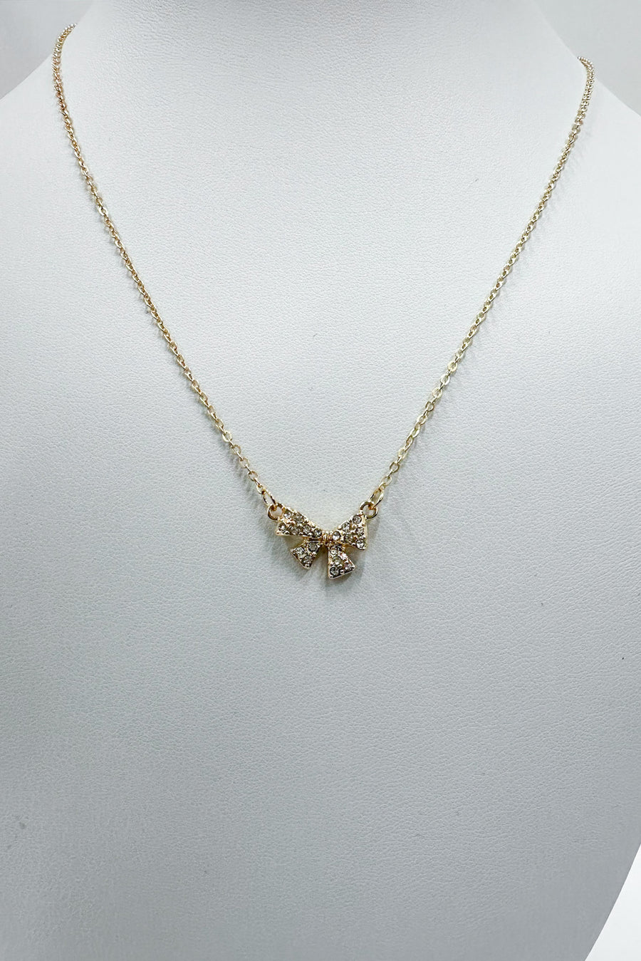 Gold Serene Elegance Rhinestone Bow Charm Necklace - Madison and Mallory