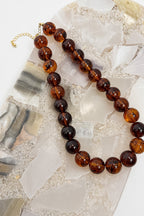 The Round About Tortoise Beaded Necklace - Madison and Mallory