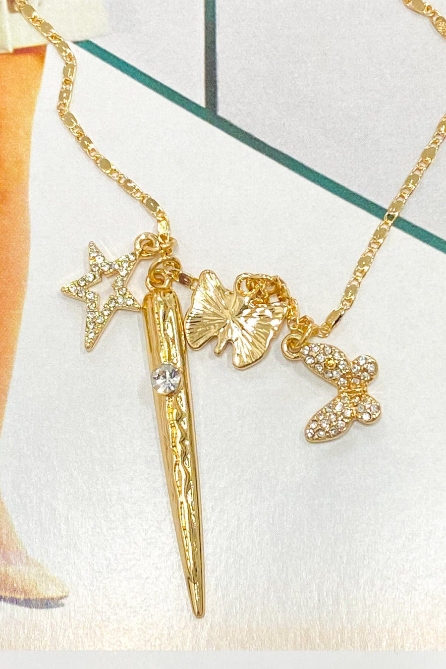 Gold Jolita Butterfly and Star Charm Necklace - Madison and Mallory